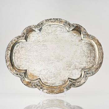 A lobed silver tray on four feet, Shanghai, Singfat, China Trade.