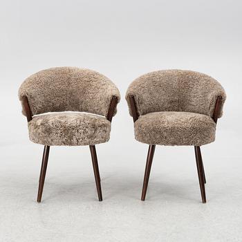 A pair of upholstered armchairs, AB Bröderna Biörs Snickerifabrik, Sweden, 1950's.