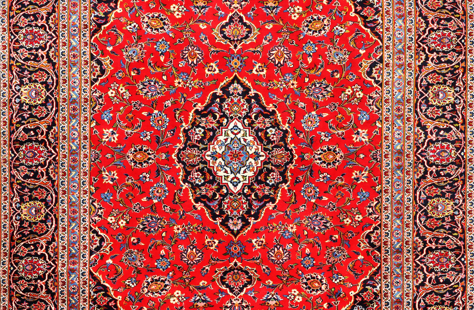 A Keshan carpet, c. 330 x 245 cm.
