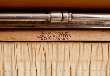 An early 20th cent monogram canvas trunk by Louis Vuitton.