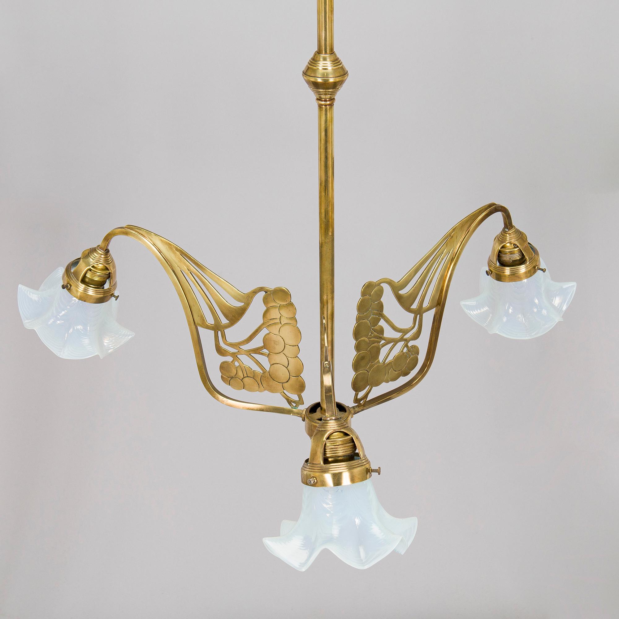 Kattovalaisin, 1900-luvun alku.