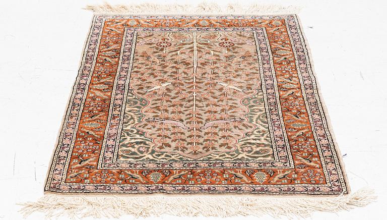 An oriental rug, c. 135 x 85 cm.