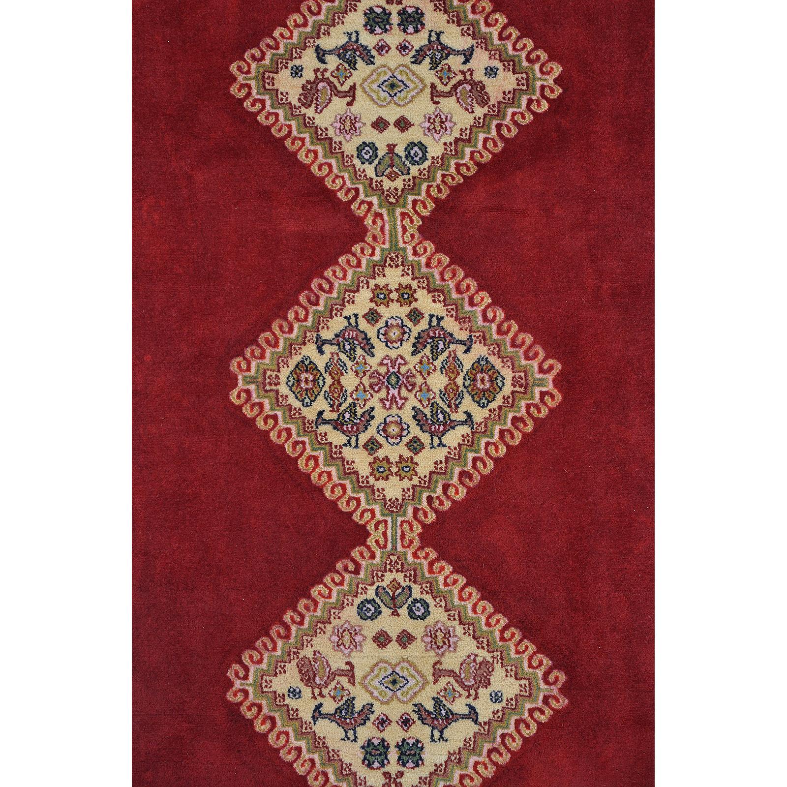 A Persian Rug, approximately 240 x 165 cm.