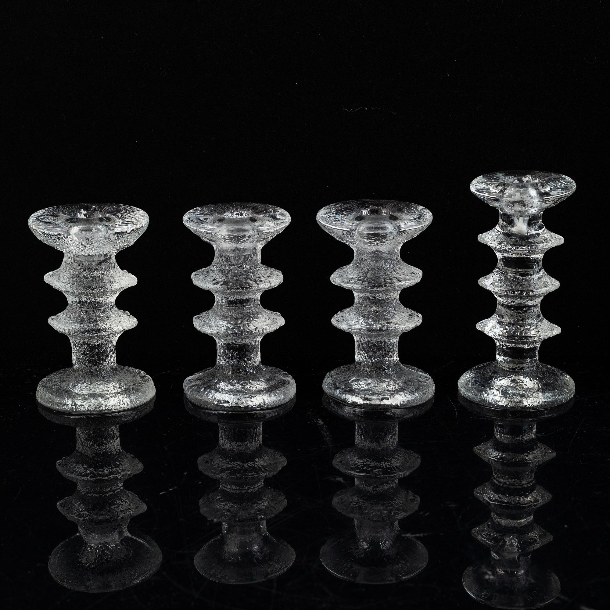 Eight 'Festivo' glass candle holders by Timo Sarpaneva, Iittala, Finland.