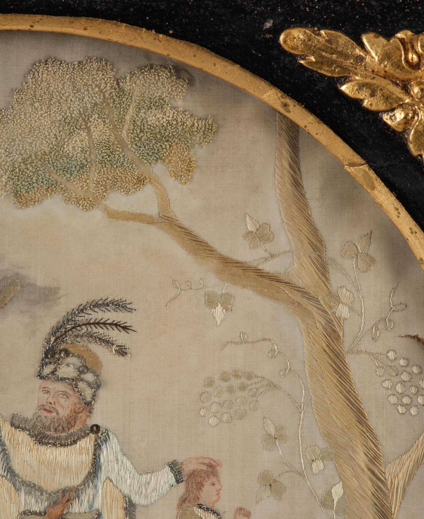 A late Gustavian frame and silk embroidery, dated 1802.