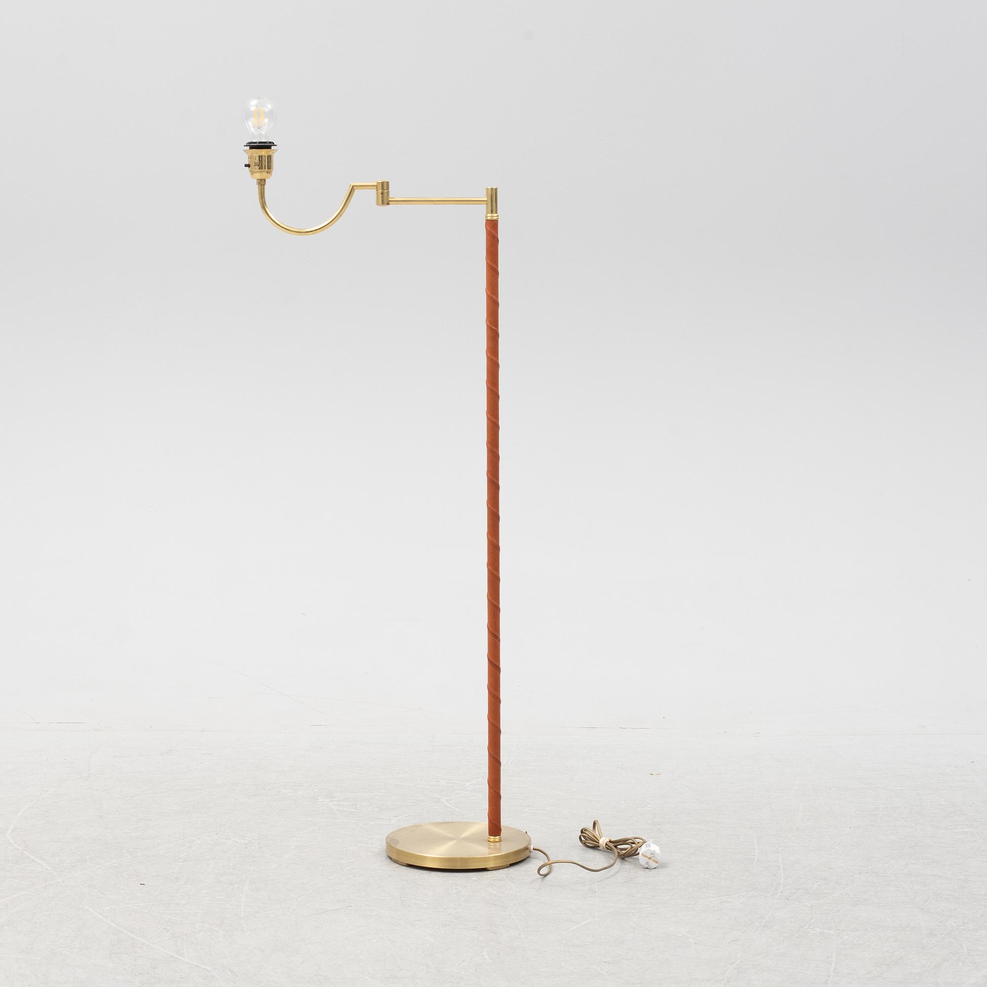 A brass floor lamp from EWÅ, second part of the 20th Century.