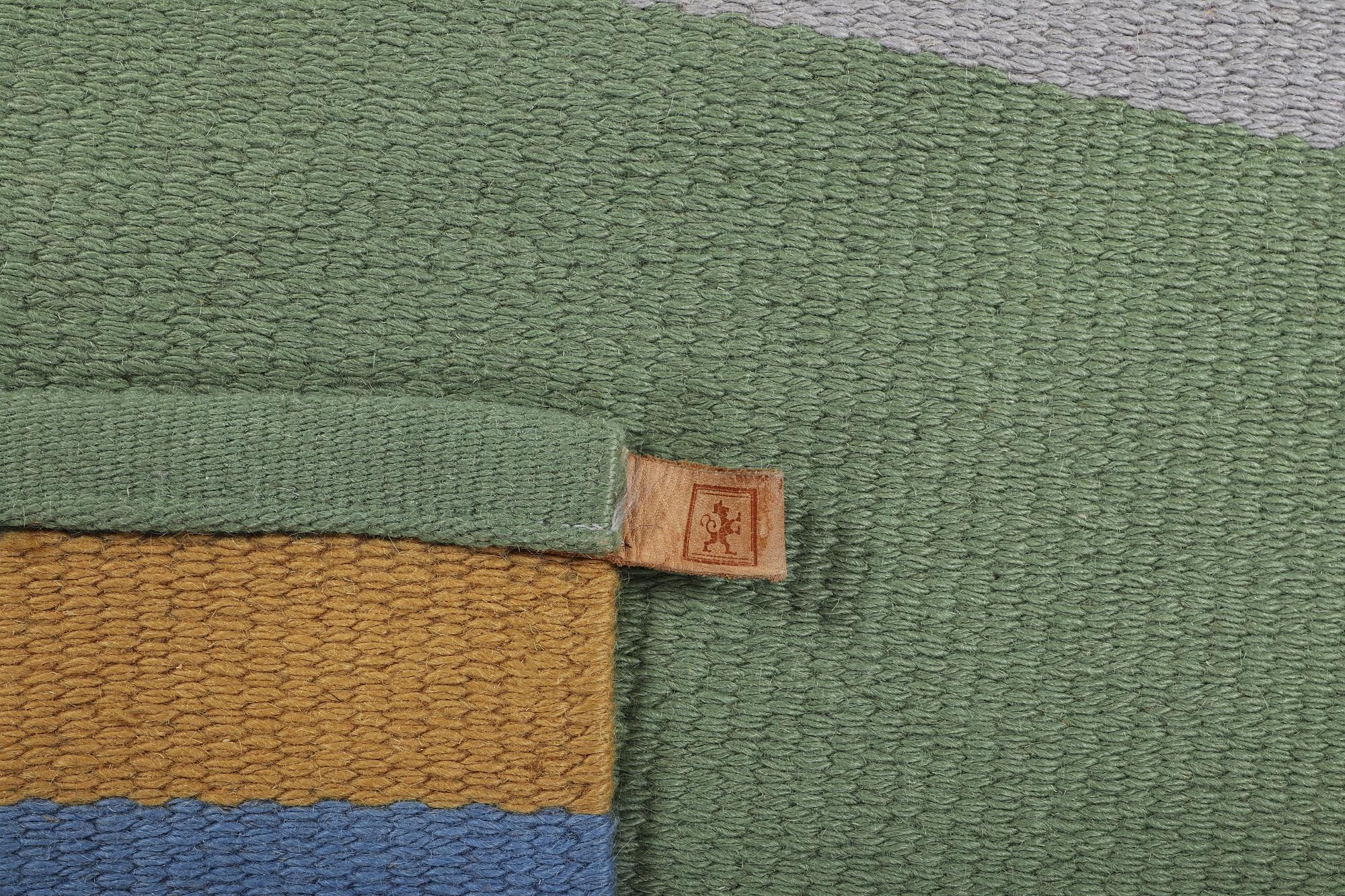 A flat weave runner carpet, Kasthall, Sweden, c. 340 x 83 cm.