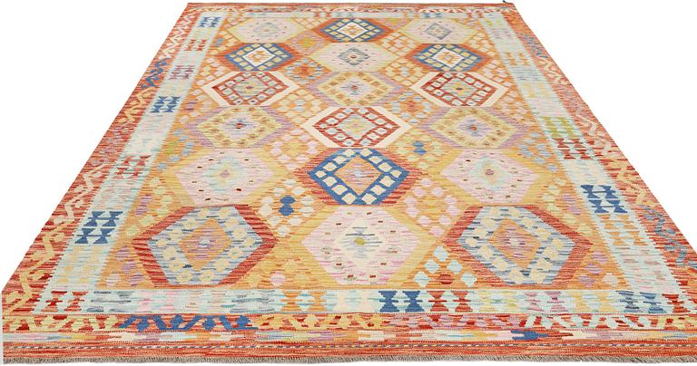 A Kilim carpet, c. 299 x 205 cm.