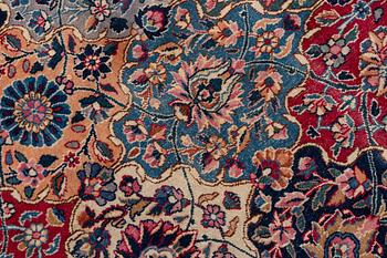 A semi-antique Kerman carpet, of Safavid 'vase' design, ca 484 x 291 cm.