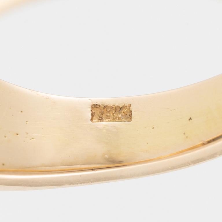 Ring, 18K gold with blue topaz.