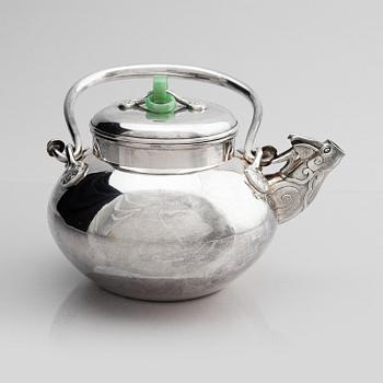 A silver tea pot with cover, Japan, early 20th century.