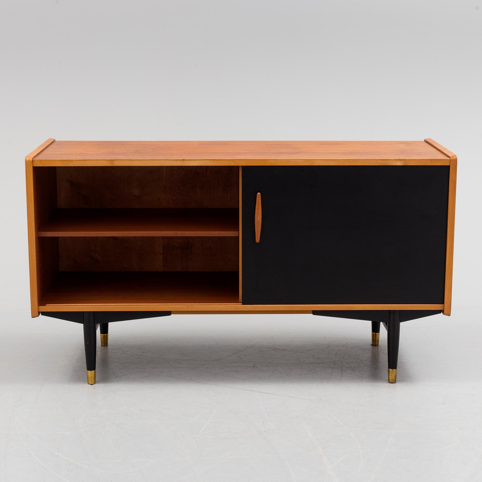 A 1950s / 60s Nils Jonsson sideboard veneered with teak model 222 from Hugo Troeds in Bjärnum.