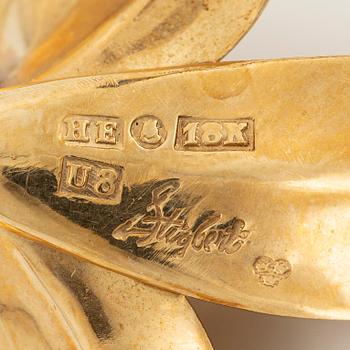 Brooch/pendant, Engelbert, Stigbert, in the form of a lily, 18K gold.