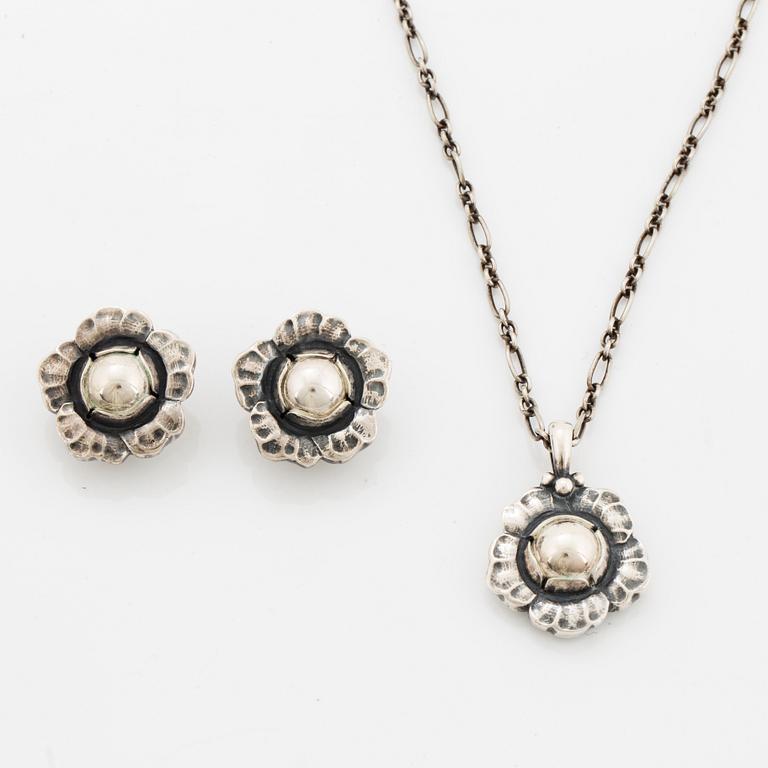 Georg Jensen Heritage silver a pair of earrings and a necklace.