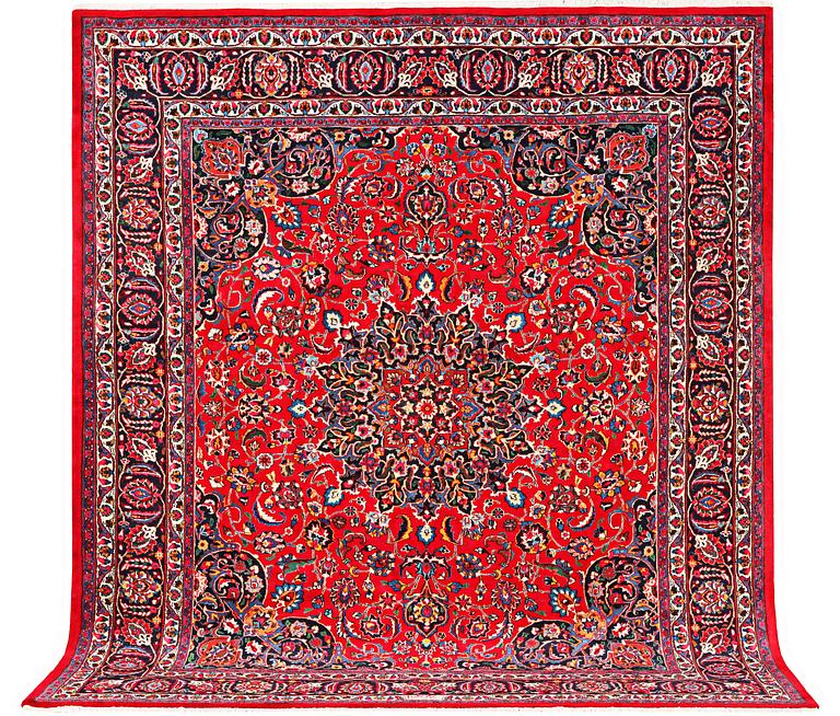 A Najafabad carpet, c. 351 X 305 cm.