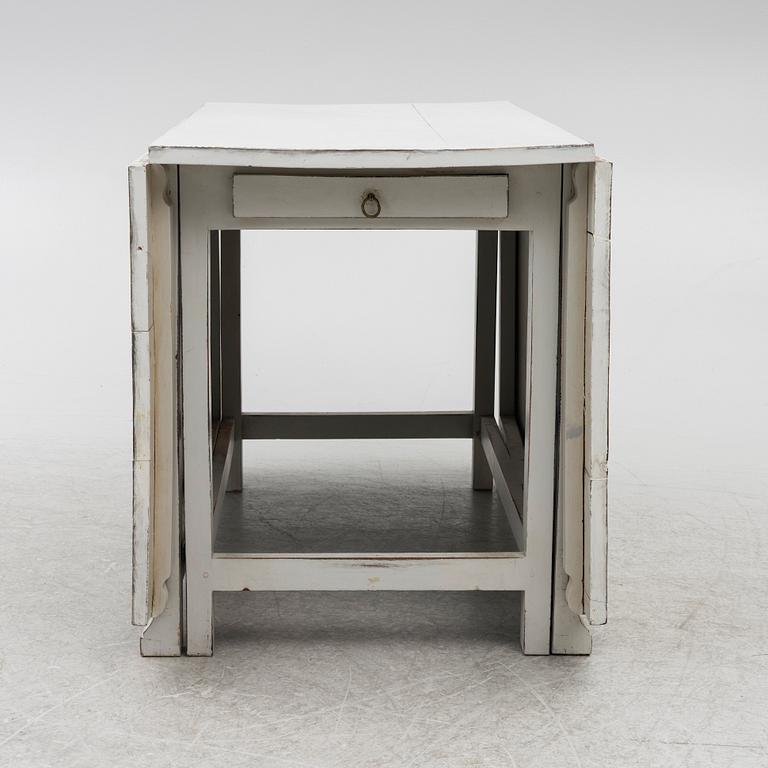 A drop-leaf table, 19th century.