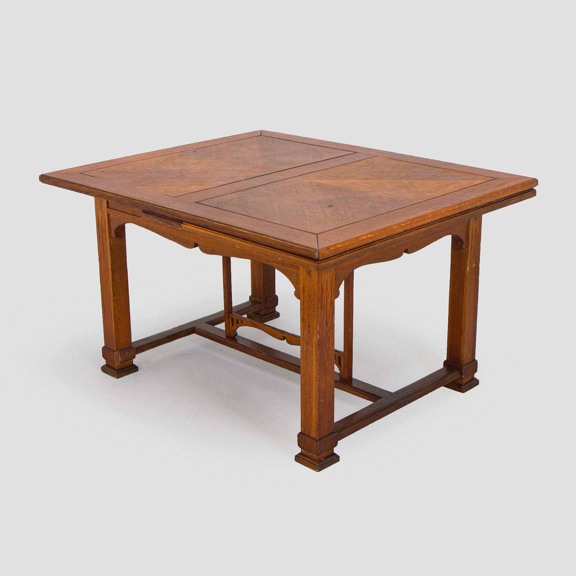 Dining table and six chairs, early 1900.