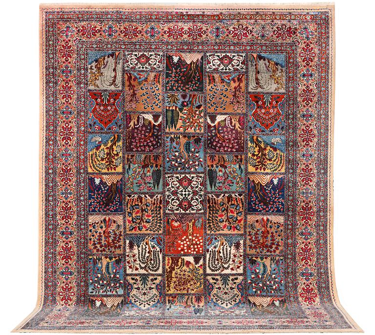 A Kashmar carpet, c. 387 x 297 cm.