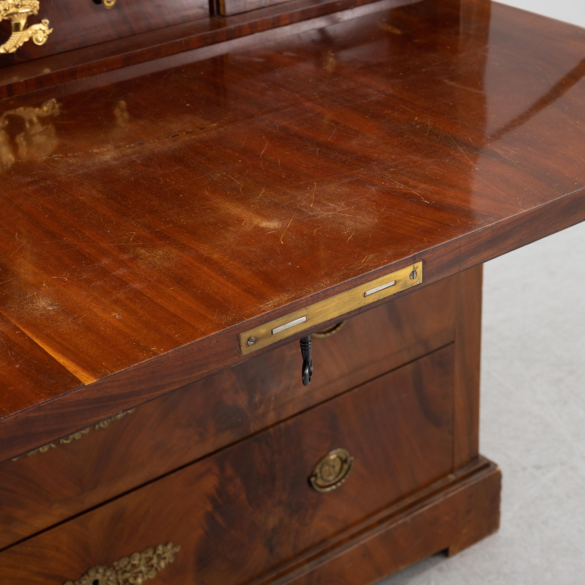 A Swedish Empire secretaire by J. Öman, master 1815-1833.