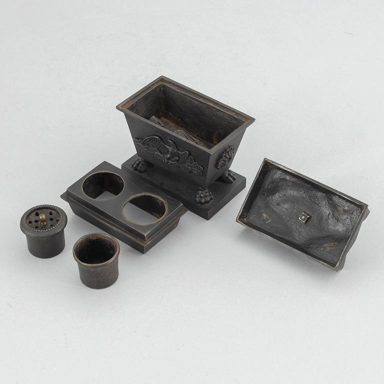 A cast iron inkwell in the form of the sarcophagus of Napoleon, Königliche Preußische Eisengießerei, Berlin, ca. 1815-20.