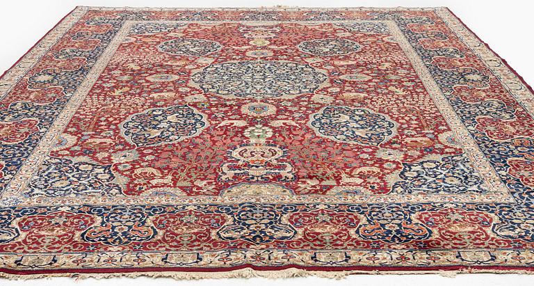 A semi-antique Benlian Tabriz carpet, signed Jabarzade, c. 416 x 308 cm.