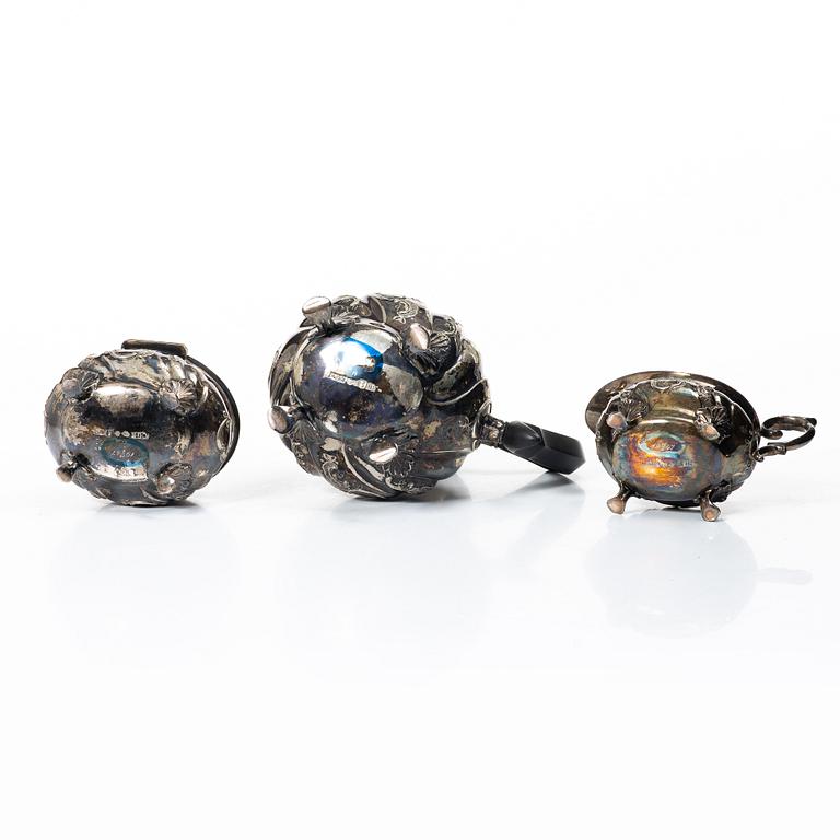 C.G. Hallberg, A three piece Roccoco style silver coffee service, Stockholm 1946.