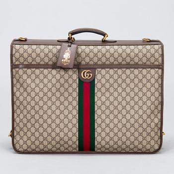 Gucci, a 'Savoy' garment bag.