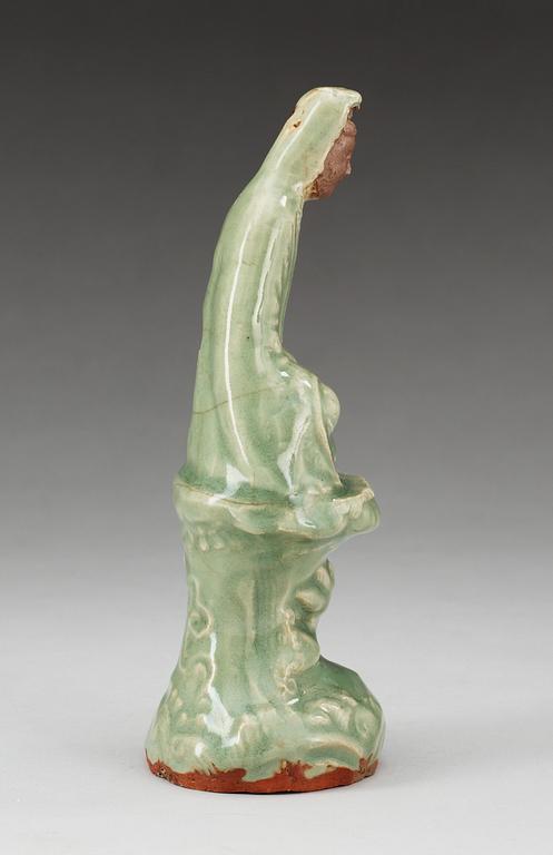 A celadon glazed figure of Guanyin, Ming dynasty.