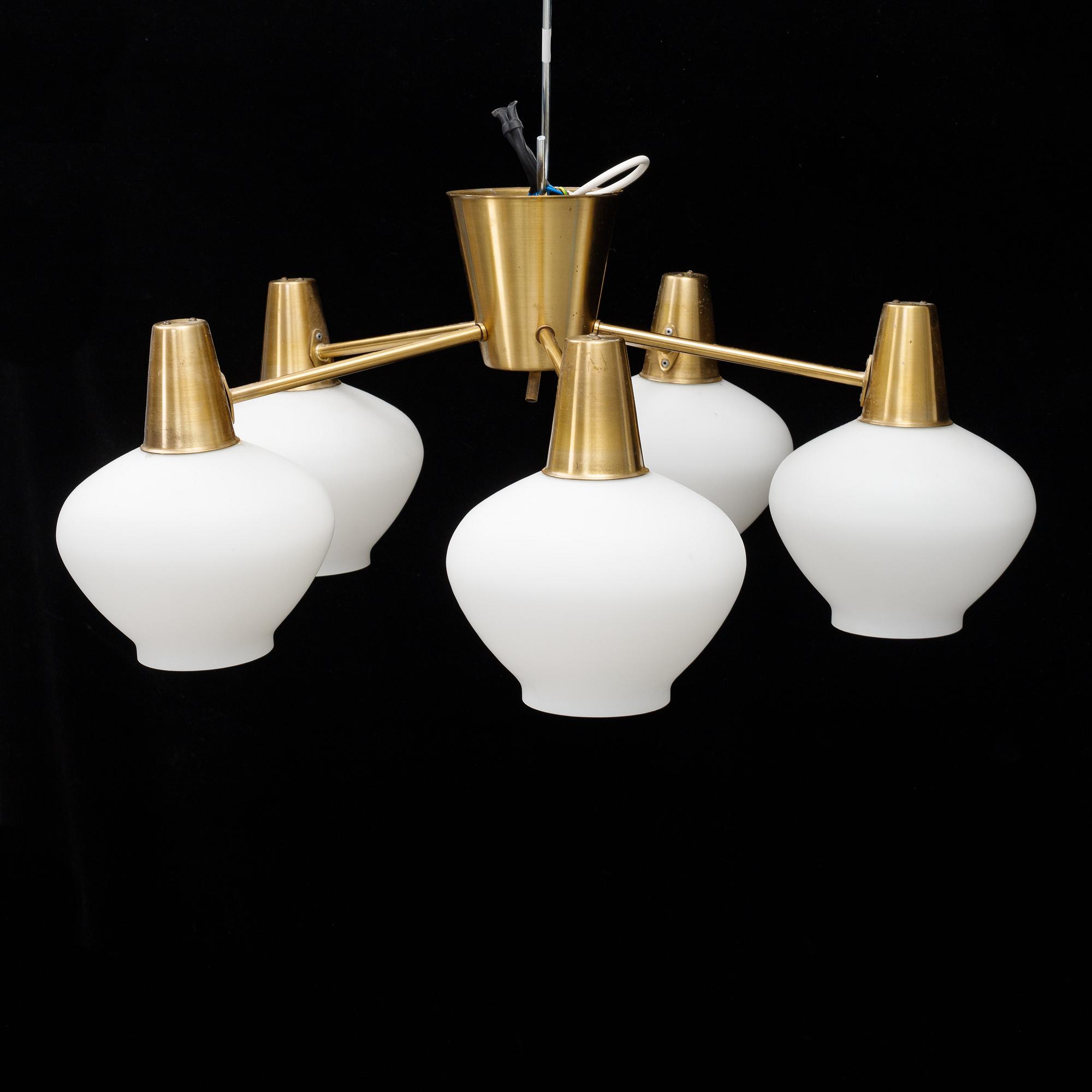 A mid 20th Century brass and glass ceiling light from Asea.