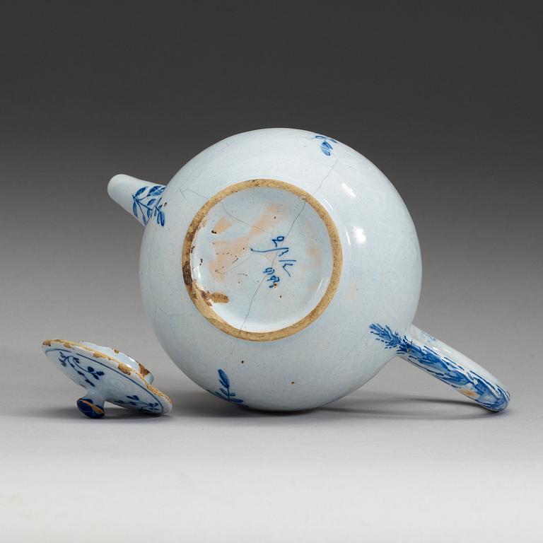 A Swedish Rörstrand faience teapot with cover, 18th Century.
