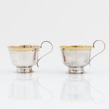 Twelve parcel gilt silver mugs, Johanna Gottschalk, Arkala, Stockholm, 1962-68.