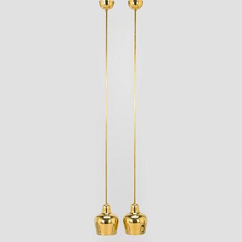 Paavo Tynell, a pair of mid 20th century ceiling lights, model 1699, for Taito / Idman.