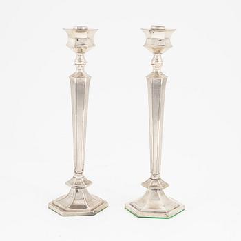 A pair of silver candlesticks, mark of Wing On, Hong Kong around 1930.