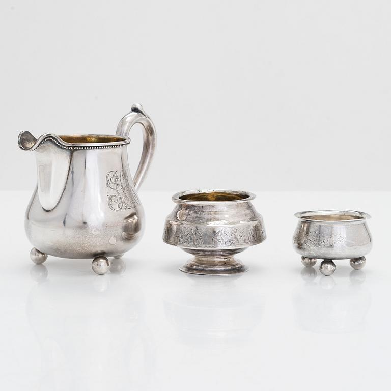 A silver cream jug and two salt cellars, Saint Petersburg, Kostroma and Moscow 1872 - 1910.