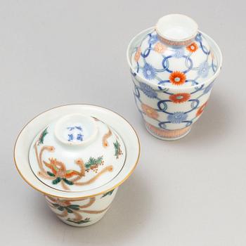 Two sets of 17+12 cups with covers (19+17), Japan, early 20th century.