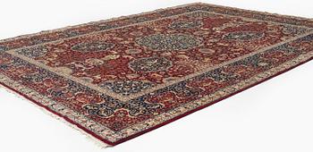 A semi-antique Benlian Tabriz carpet, signed Jabarzade, c. 416 x 308 cm.