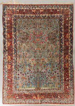 A semiantique Ghom carpet ca 287 x 204 cm.