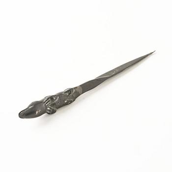 Firma Svenskt Tenn, a pewter hand mirror model A 1497 and a letter opener in the shape of an alligator, Stockholm, 1930s-40s.