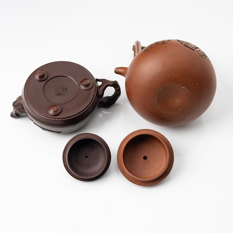 Two Chinese yixing teapots, early 1900s and 1980s.