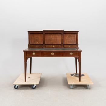 A Gustavian style mahogany desk around 1900.