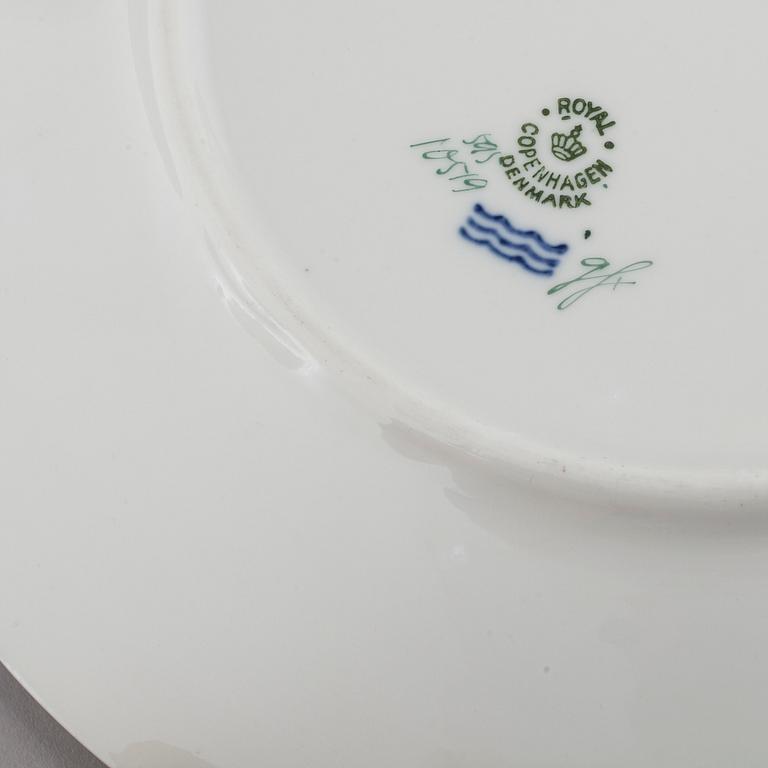 78 pieces of porcelain ware, model "Golden Baskett" by Royal Copenhagen, second half of the 20th cenutry.