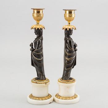 A pair of Louis XVI 18/19 century candlesticks.
