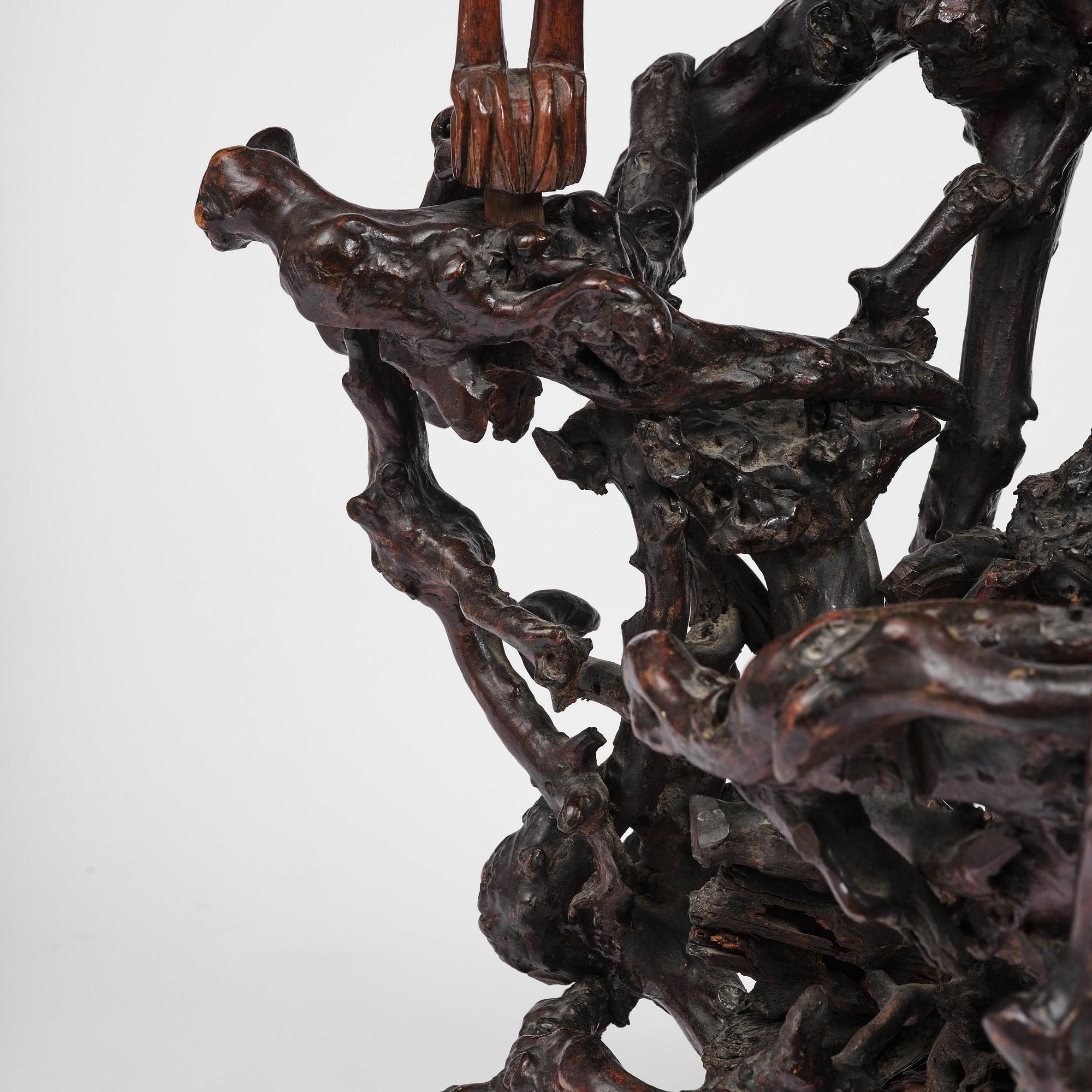 A large well sculptured root sculpture of 'Sholau and attendant', late Qing dynasty, 19th century.