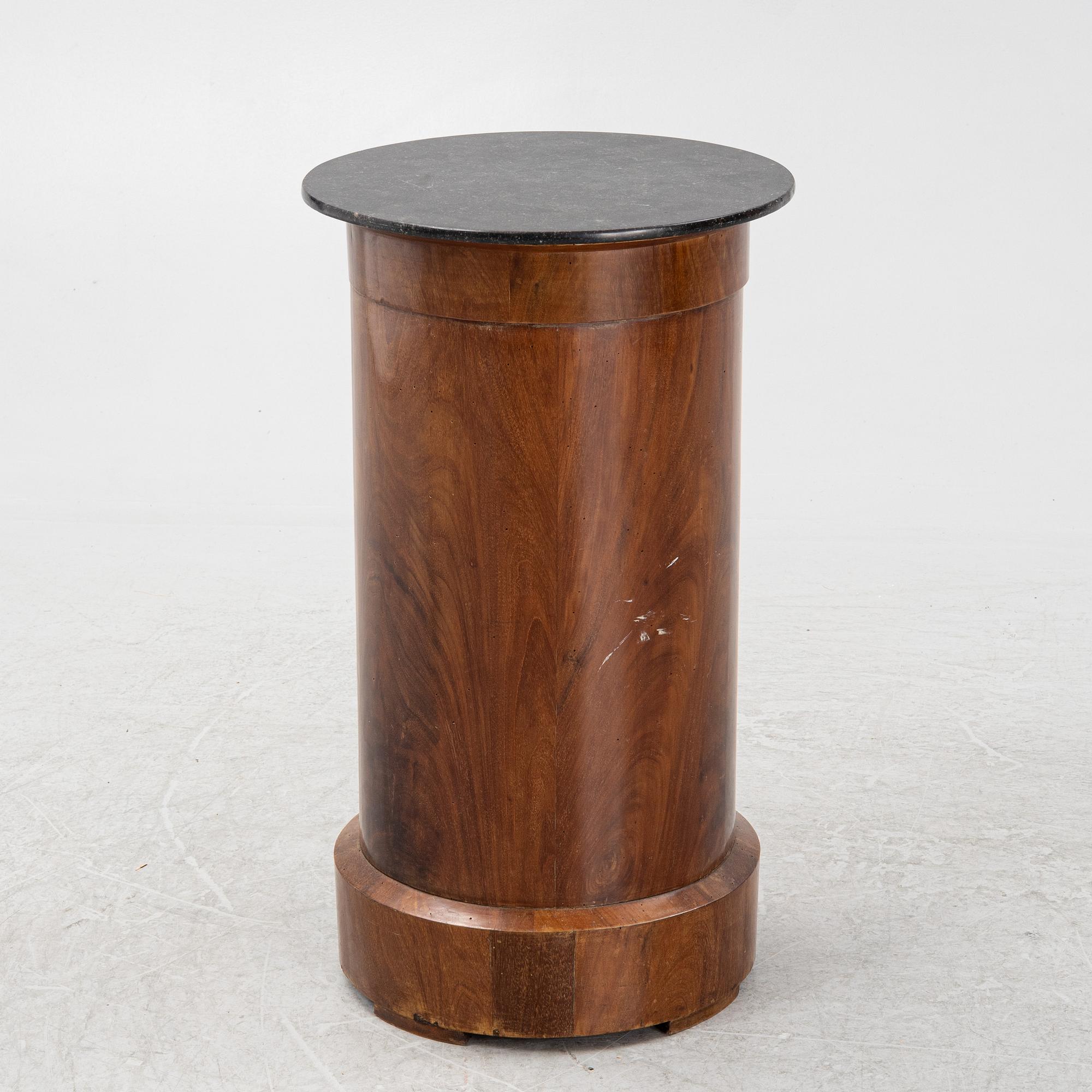 A mahogany veneered cabinet/bedside table with stone top, 19th Century.
