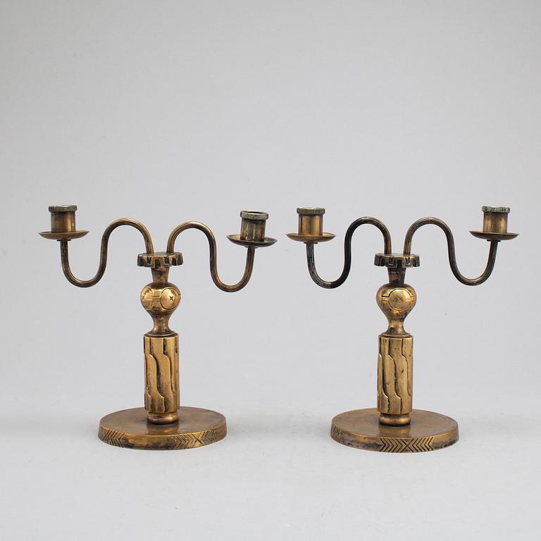 A pair of bronze candelabra, marked H. Bergman, 1920's/30's.