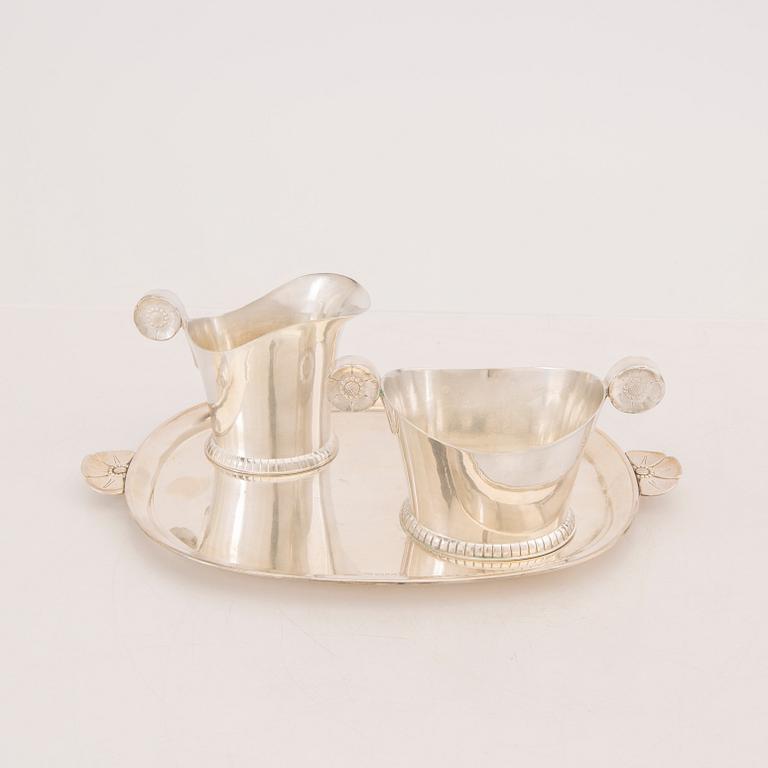 A Swedish 20th century three pcs silver creamer and suger mark of GAB Stockholm 1949 weight 447 grams.