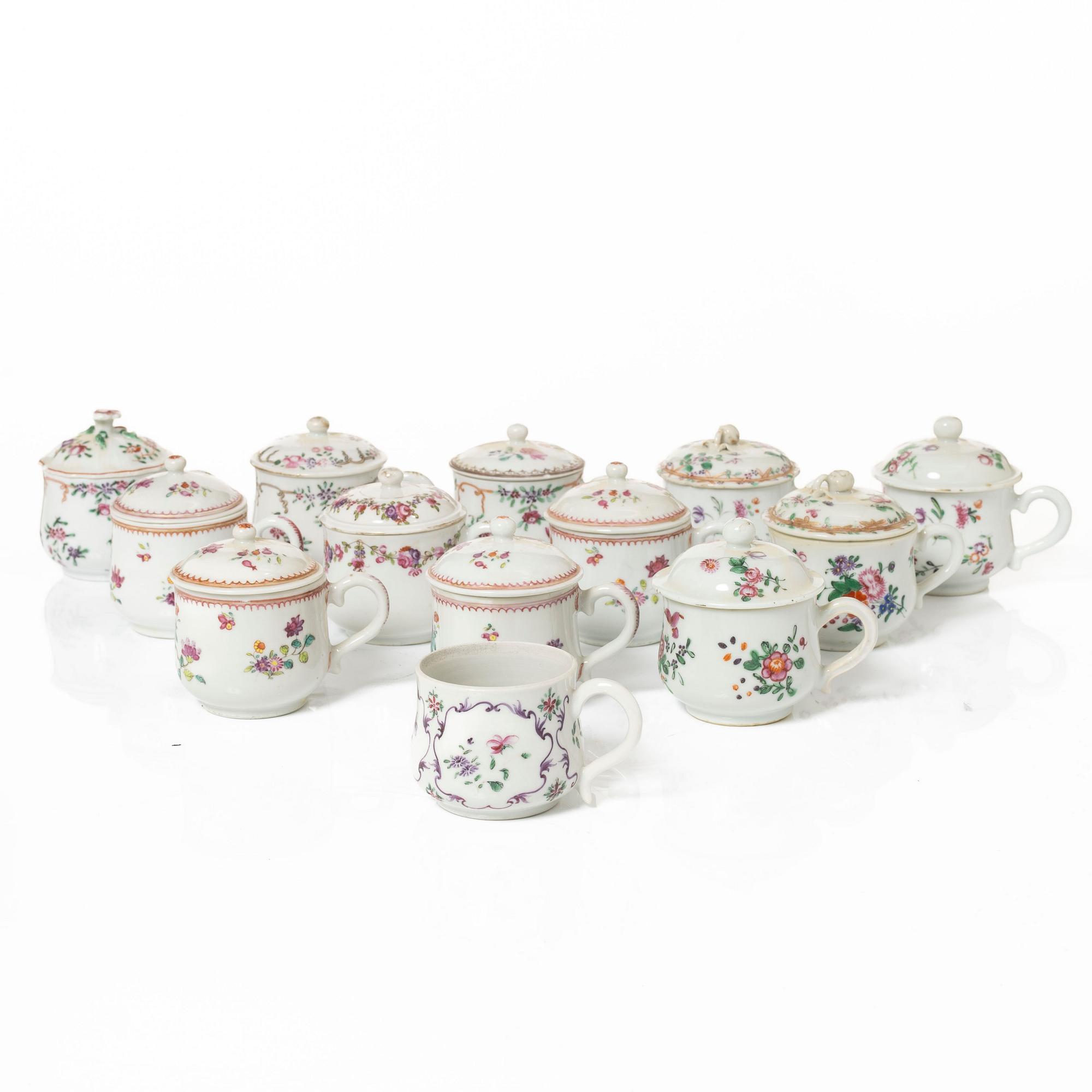 A group of 12 CHinese famille rose porcelain custard cups with covers, Qing dynasty, 18th century.
