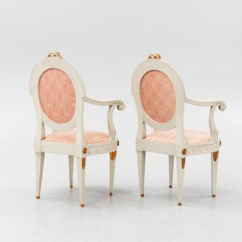 A pair of Gustavian armchiars, 19th century.