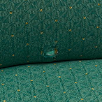 A 1960s Alf Svensson "Contour" armchair and stool.