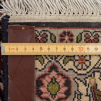 A Bidjar runner, a. 296 x 82 cm.